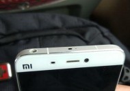 小米12R屏幕出现小洞如何处理？维修费用是多少？